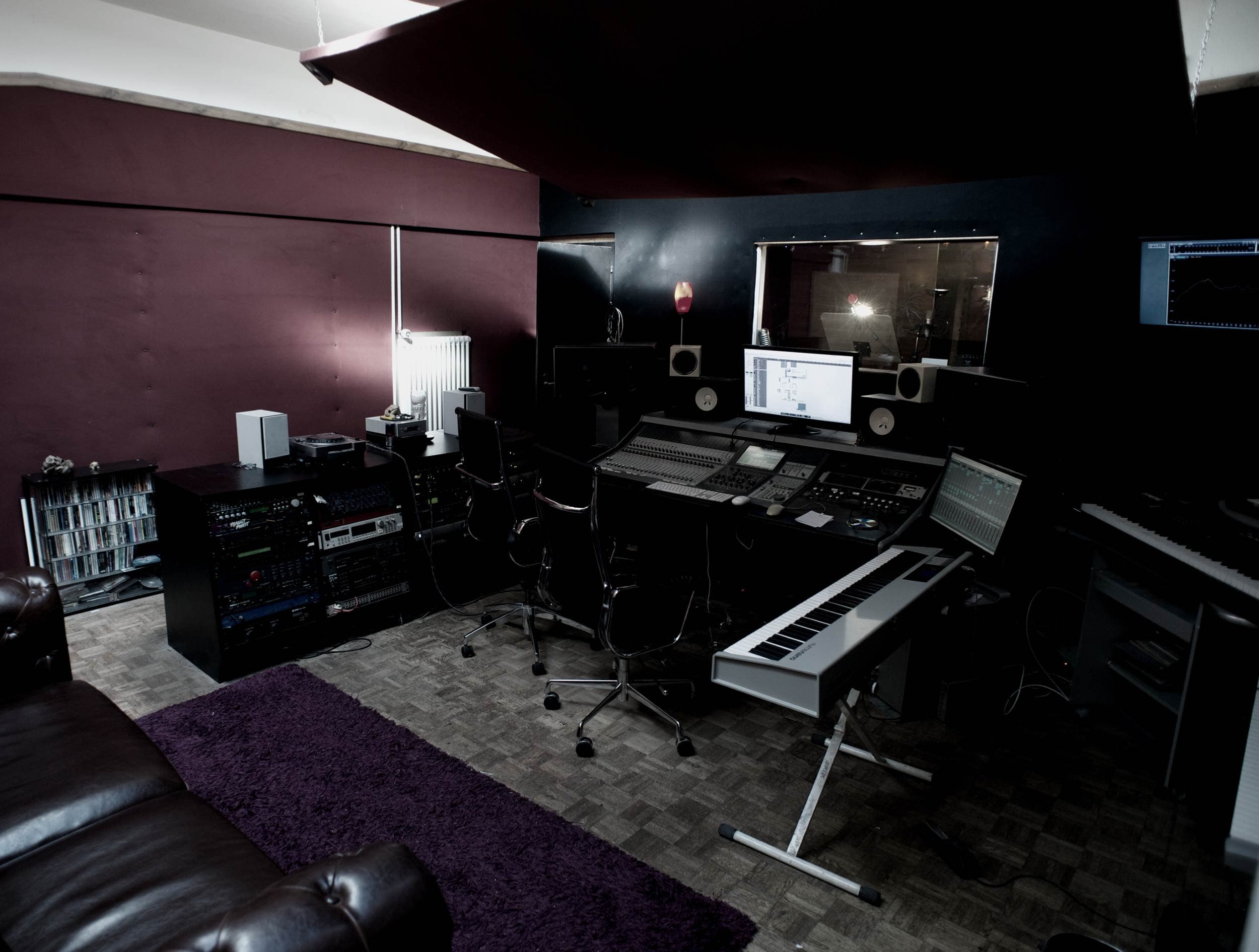 The Red Room control room with its Sony console, monitors and gold records on the wall